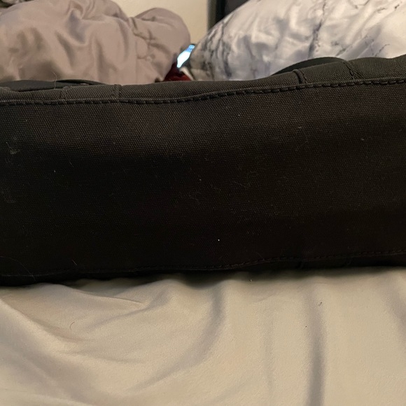 Marc Jacob’s. All black tote and white lettering. It is 13 inches. - Picture 3 of 7